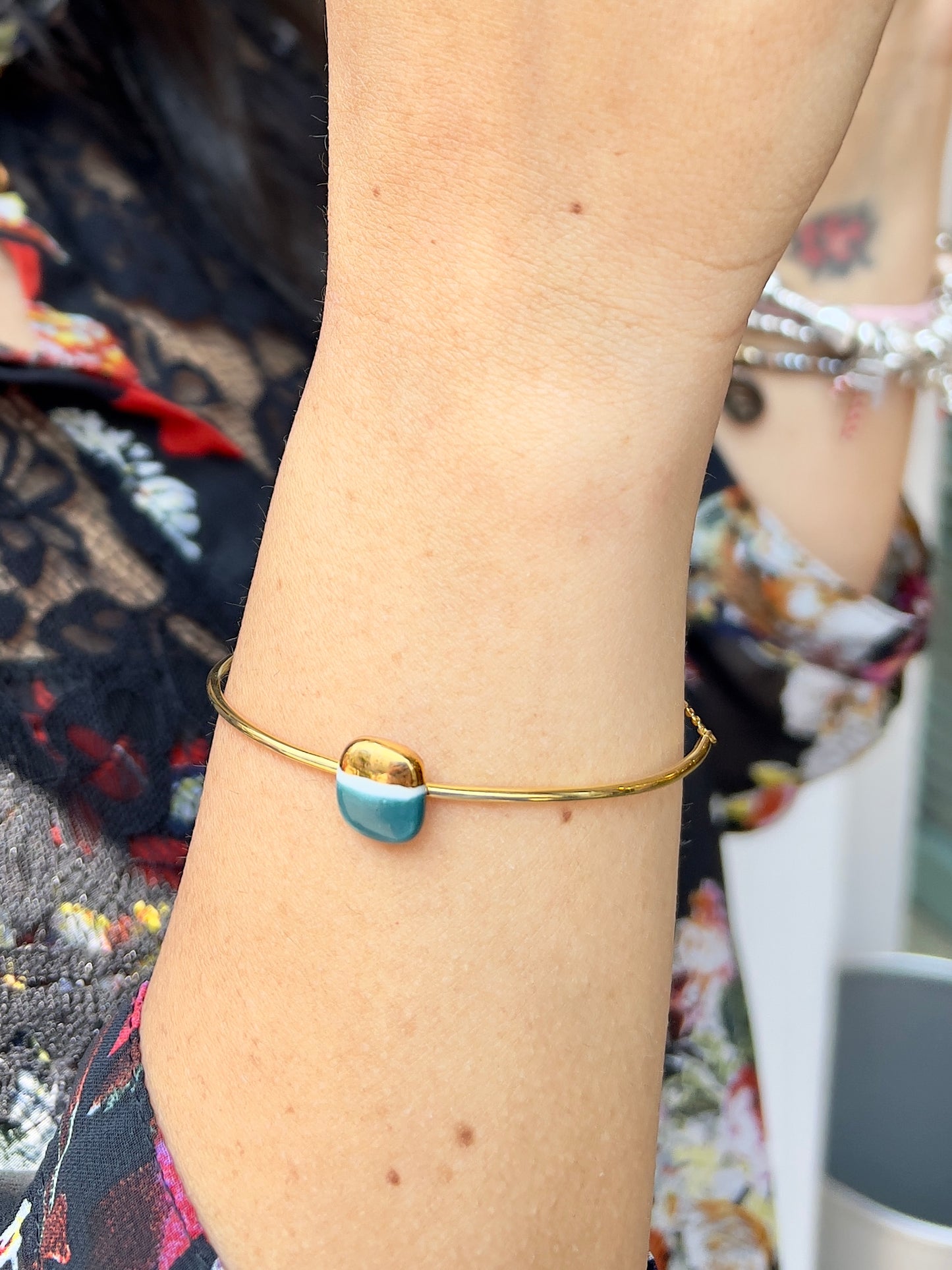 Gold and red fish bracelet