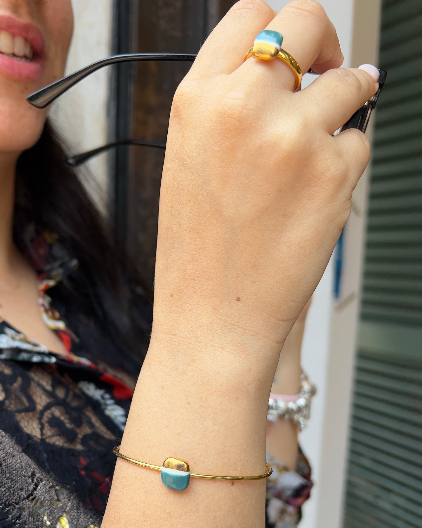 Gold and red fish bracelet