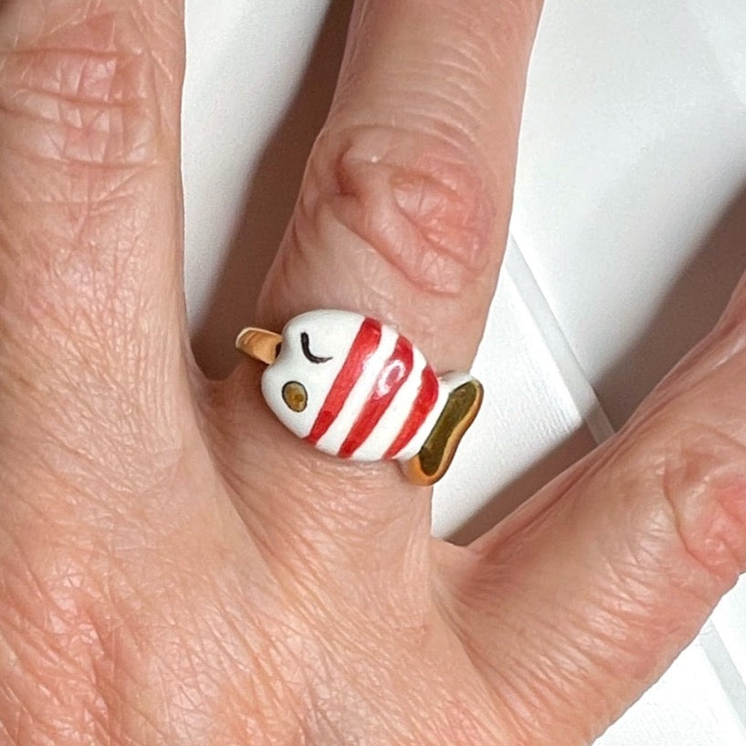 Gold and red fish ring