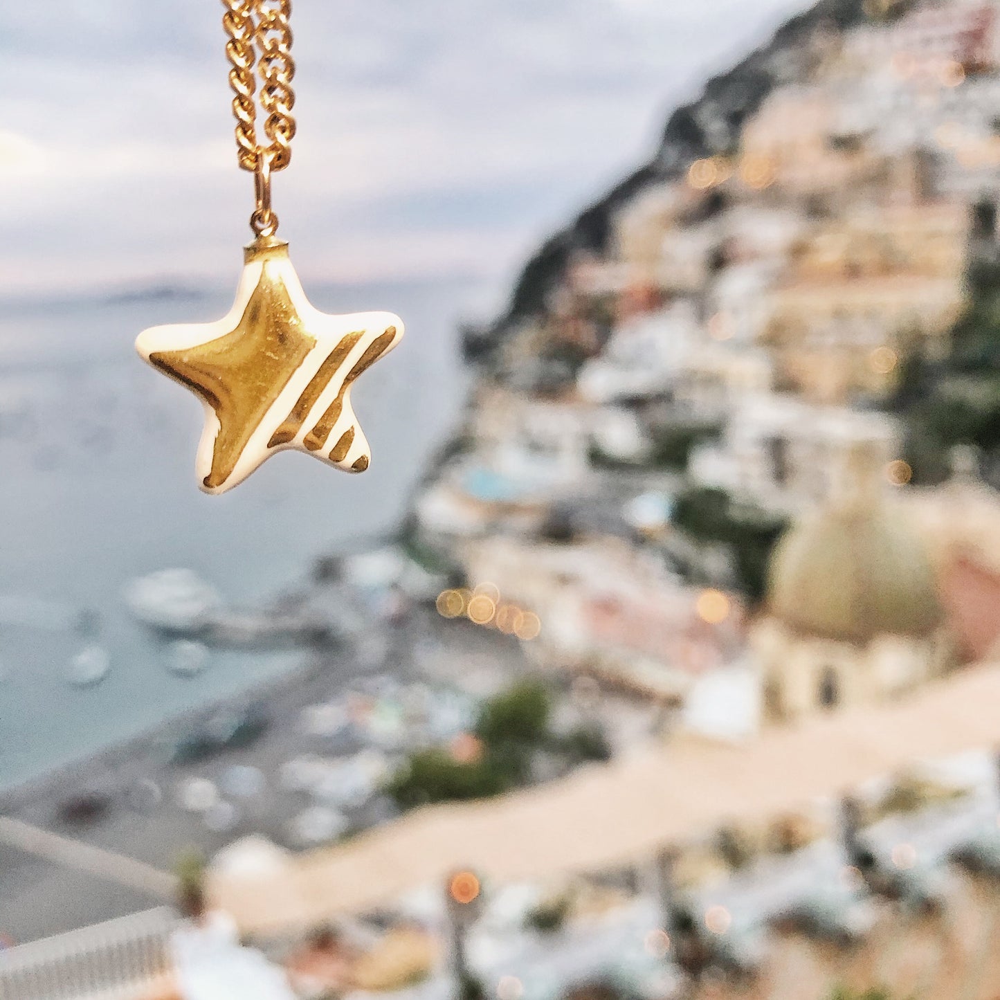 Ciondolo stella in oro