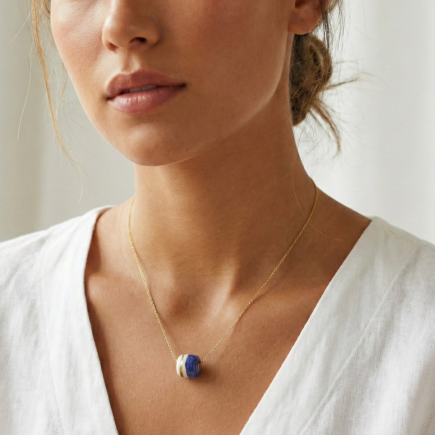 Pendant with cube. Tile print in blue and gold