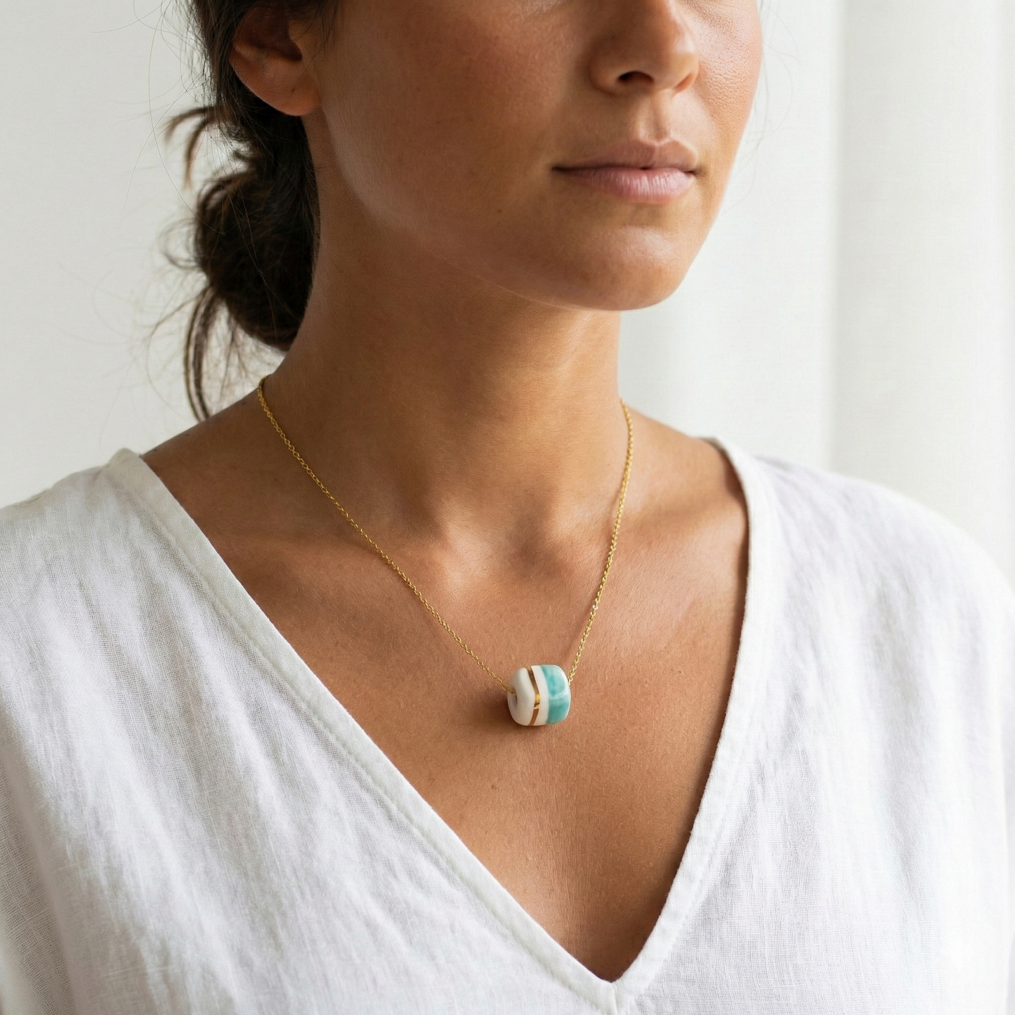 Pendant with cube. Tile print in blue and gold