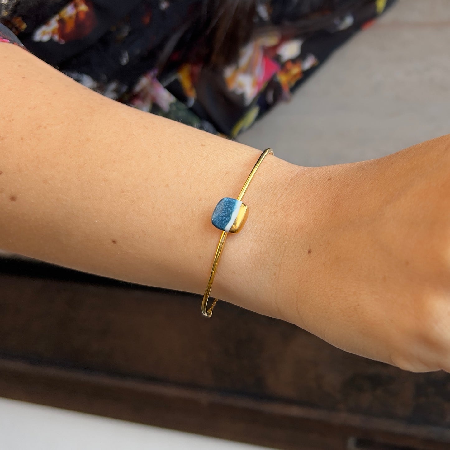 Gold and red fish bracelet