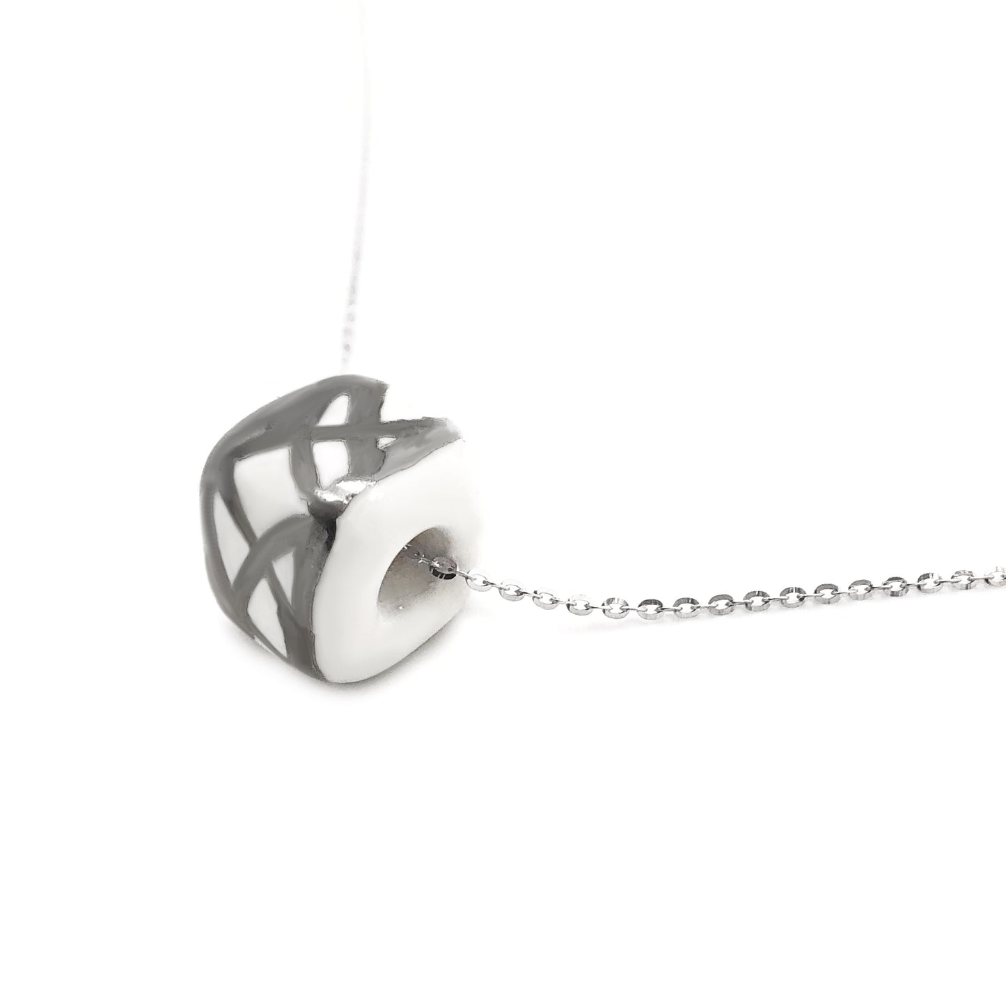 Pendant with abstract decoration in platinum