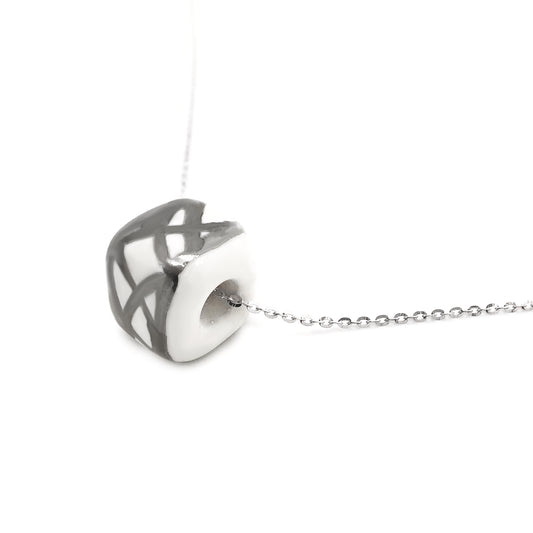 Pendant with abstract decoration in platinum