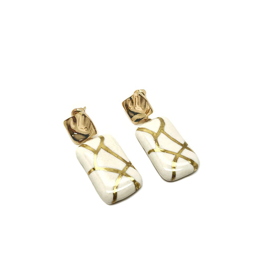 Earrings with abstract gold decoration