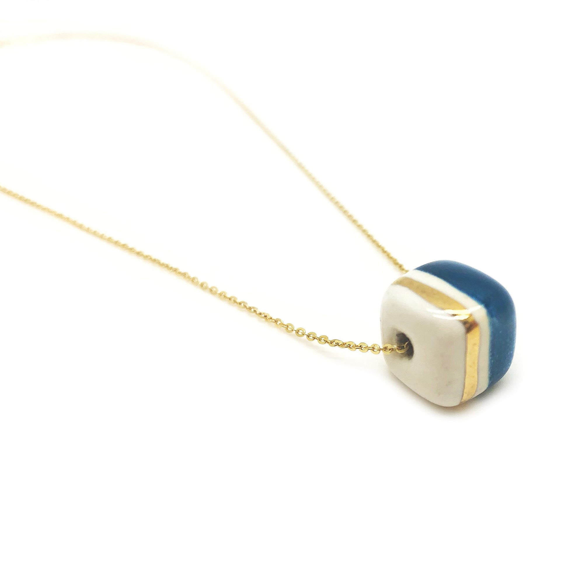 catenina cubo oro