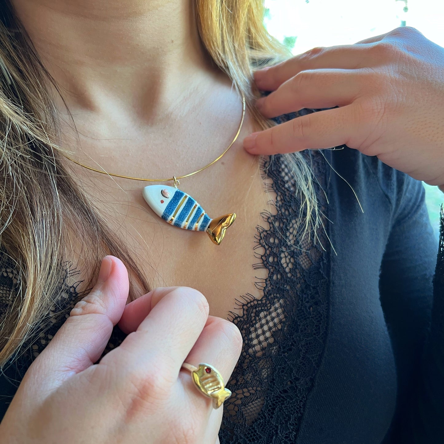 Classic gold and blue striped fish necklace